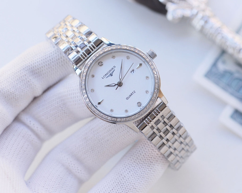 Longines watch with silver bezel and two-tone metal bracelet; white dial, quartz hands