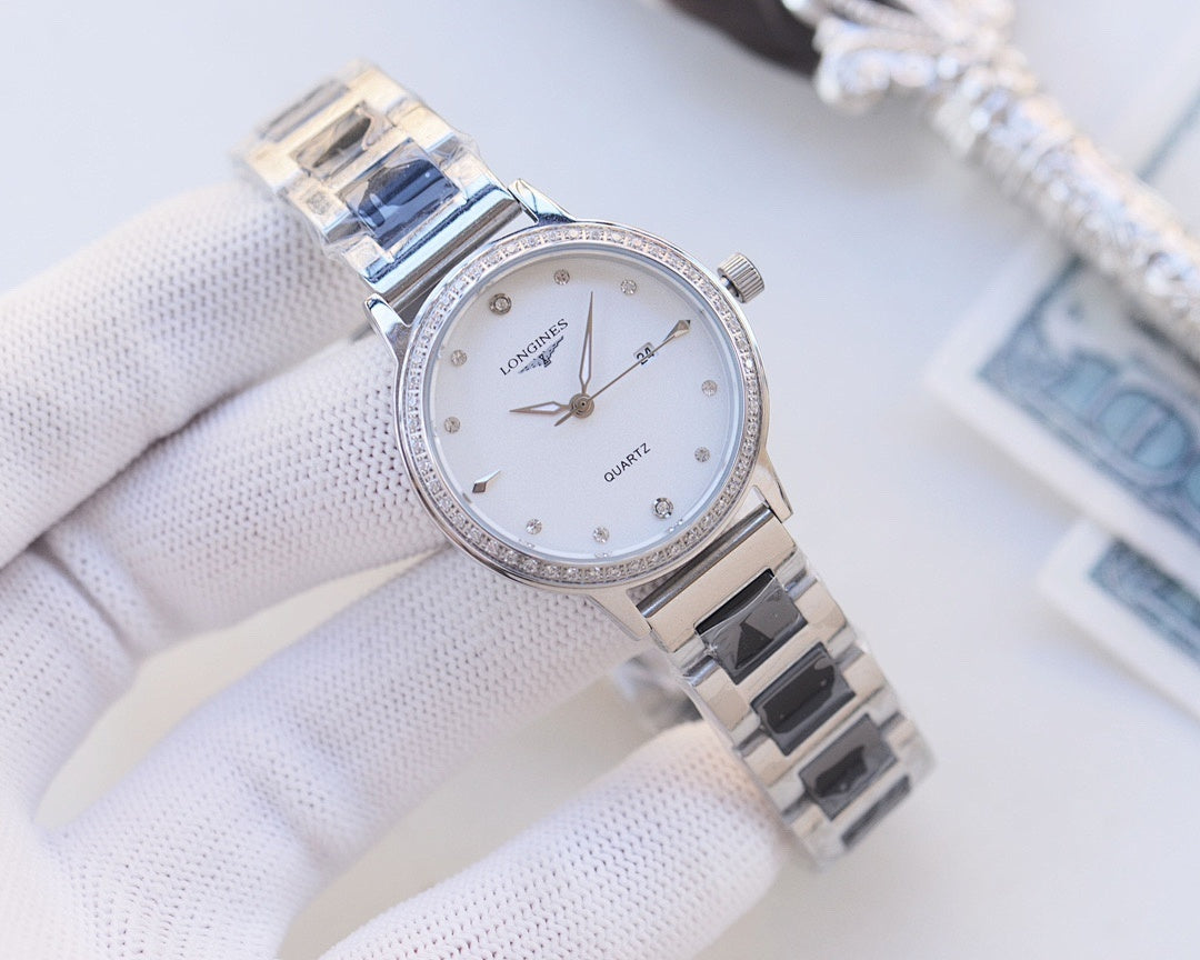 Longines watch with silver bezel and two-tone metal bracelet; white dial, quartz display