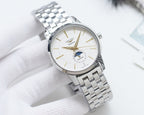 Analog watch with white dial and stainless steel bracelet, gold-tone accents