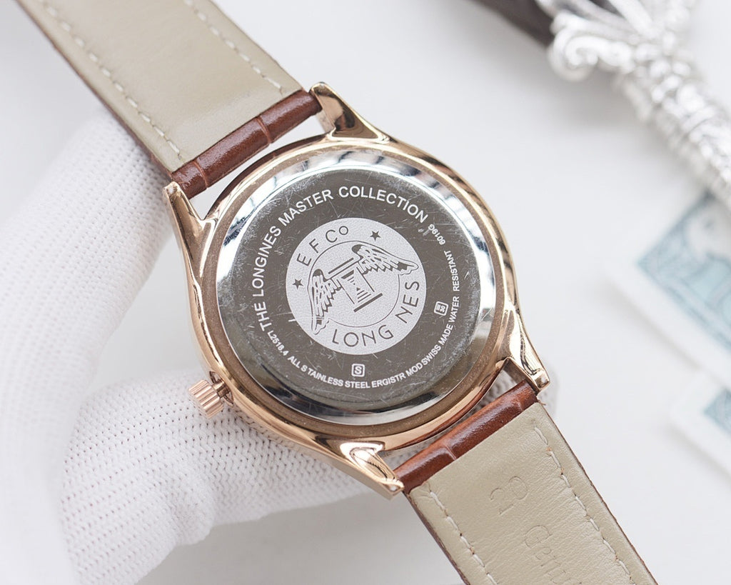Longines watch case back with 'Master Collection' medallion on brown leather strap