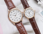 Longines watch pair, rose-gold cases with white dials and brown leather straps