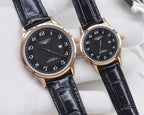 Longines watch pair, rose-gold cases with black dials and black leather straps