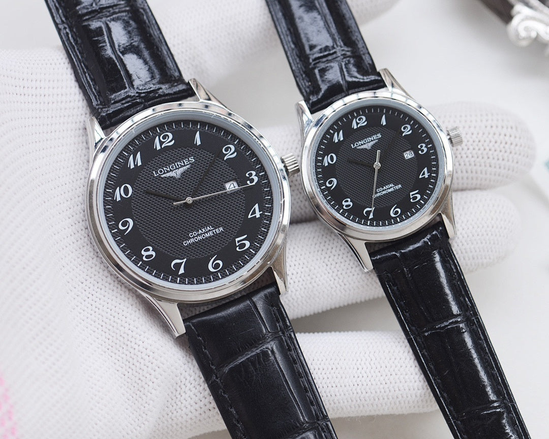 Longines watch pair, silver cases with black dials and black leather straps