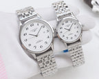 Longines watch pair, silver cases with white dials and silver metal bracelets