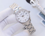 Wristwatch with white dial, silver link bracelet, stone-studded bezel, date at 3.
