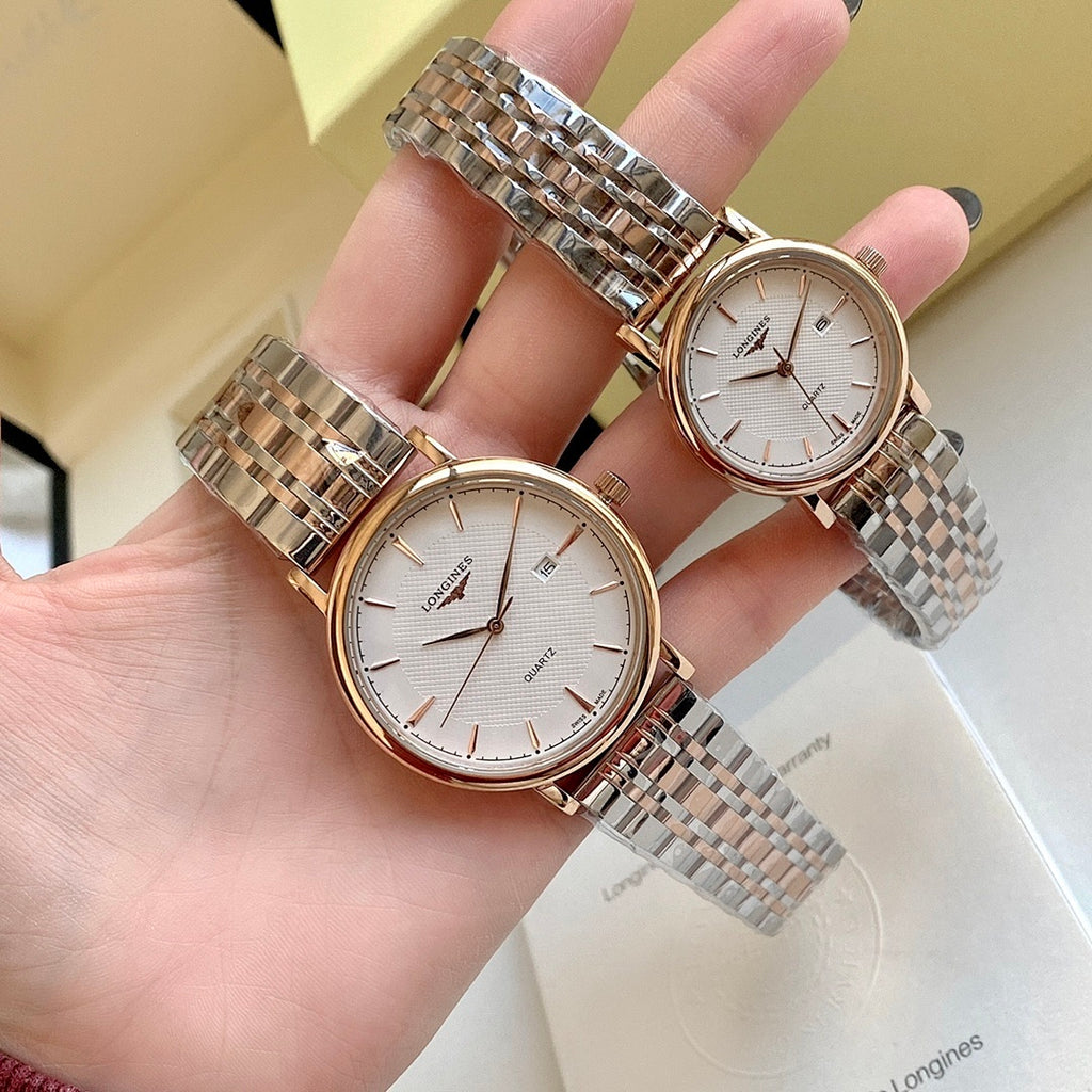 Longines watch with white dial, rose-gold case, and silver metal link bracelet.