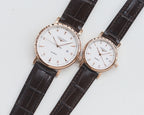 Longines quartz watch set with rose-gold tone cases and dark brown leather straps