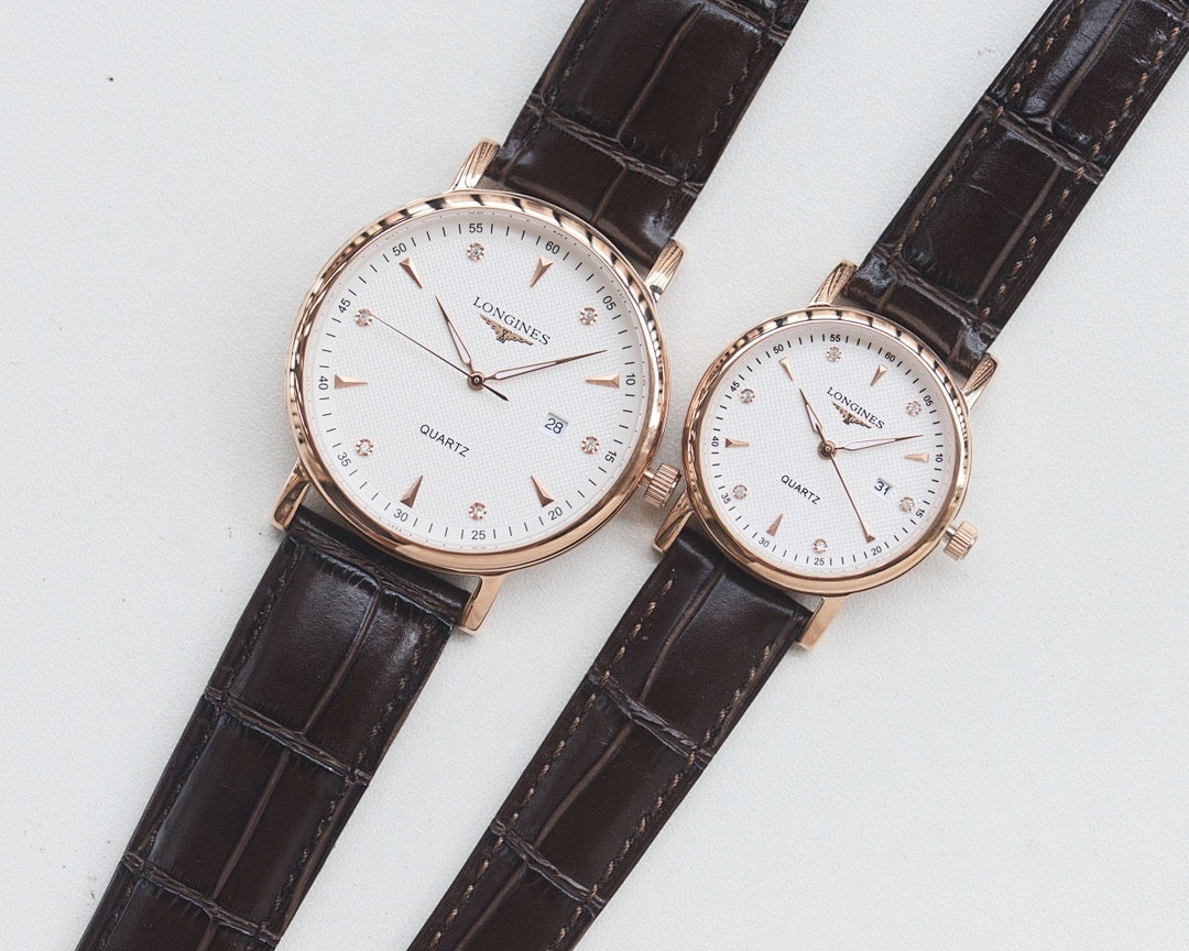 Longines quartz watch set with rose-gold tone cases and dark brown leather straps