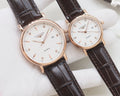 Longines quartz watch set with rose-gold tone case and dark brown leather straps
