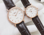 Longines quartz watch set with rose-gold tone case and dark brown leather straps