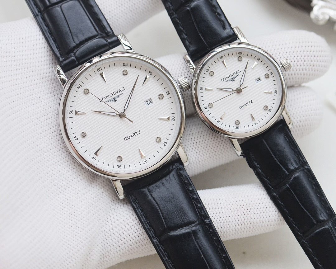 Longines quartz watch set with silver tone cases and black leather straps