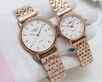 Longines quartz watch set with rose-gold tone cases and rose-gold metal bracelets