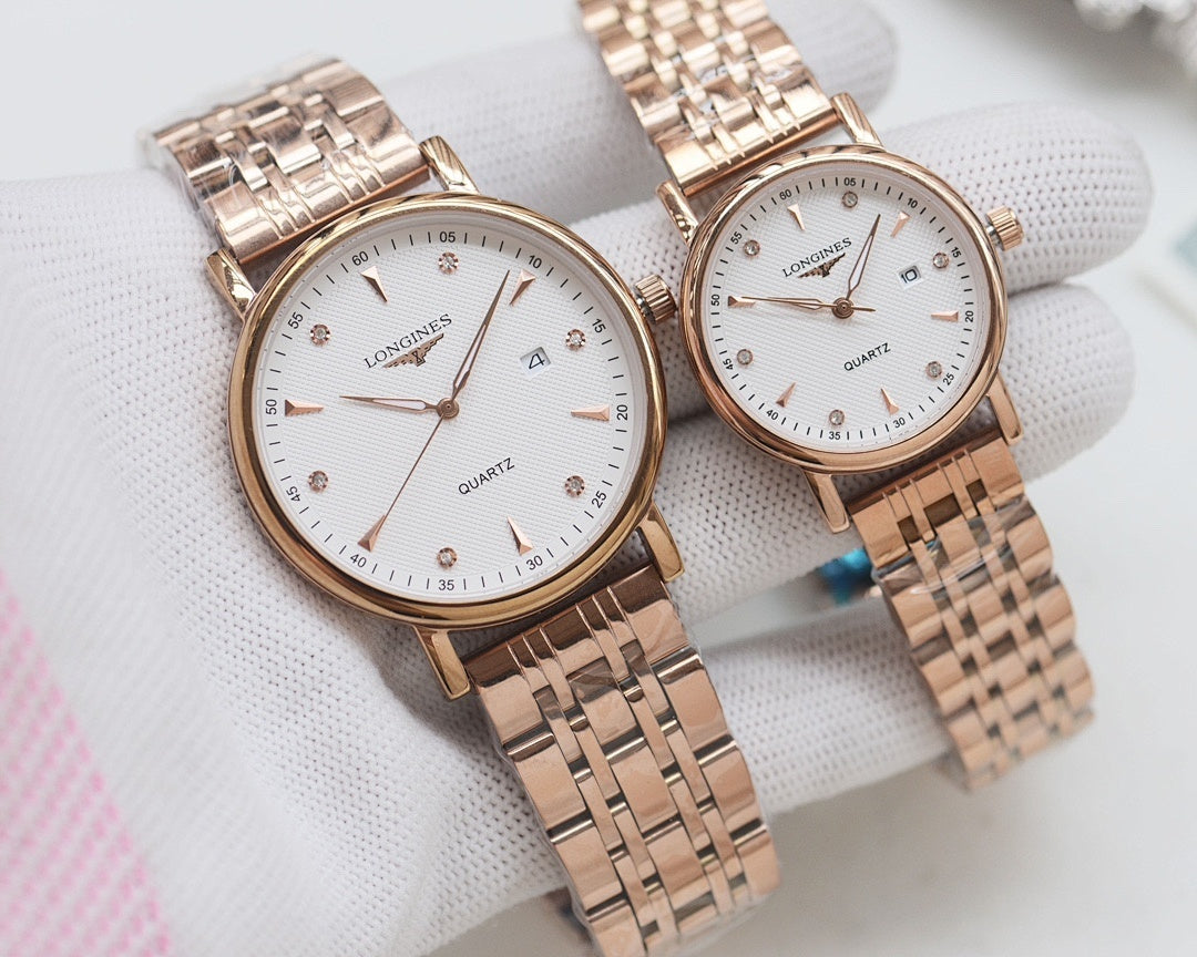 Longines quartz watch set with rose-gold tone cases and rose-gold metal bracelets