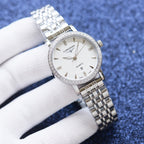 Longines quartz wristwatch with white dial and silver-tone metal link bracelet