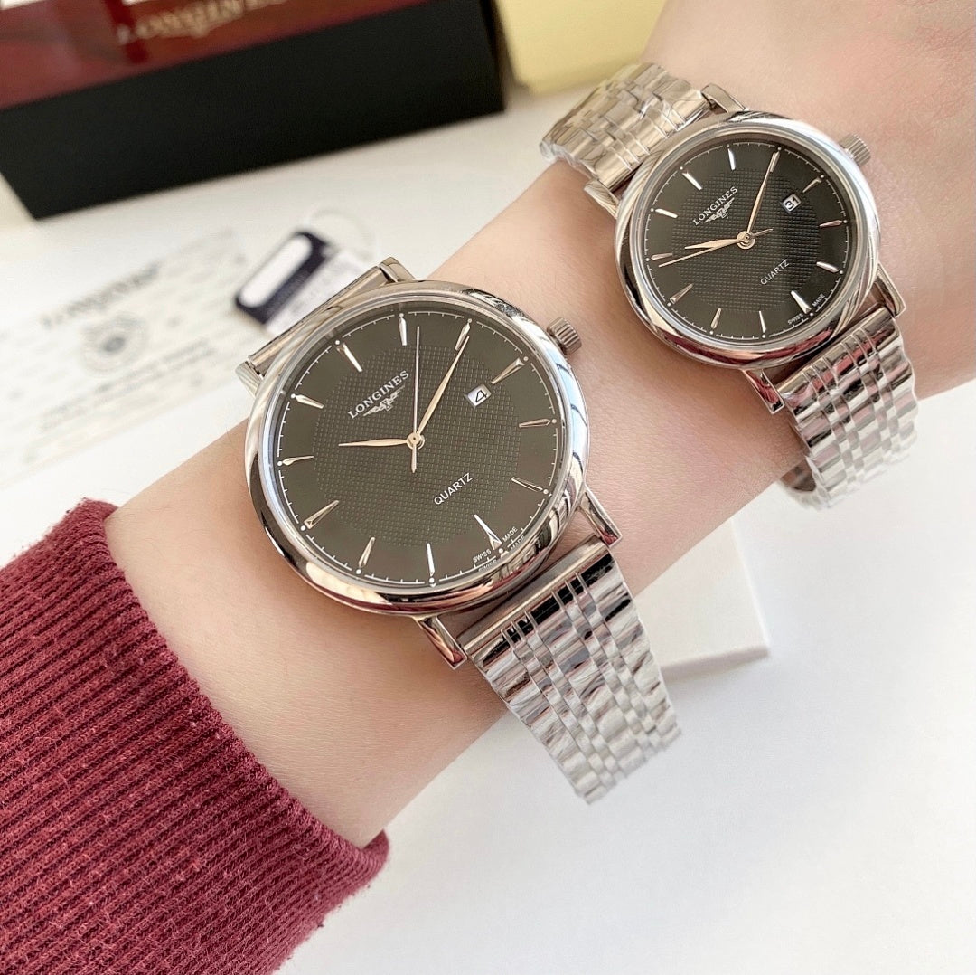 Stainless-steel wristwatch with dark dial, rose-tone hands, metal link bracelet