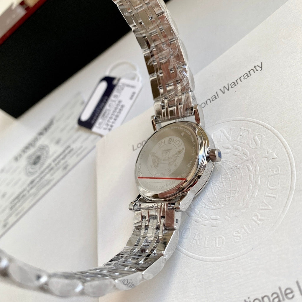 Metal link bracelet with round stainless-steel watch caseback on packaging