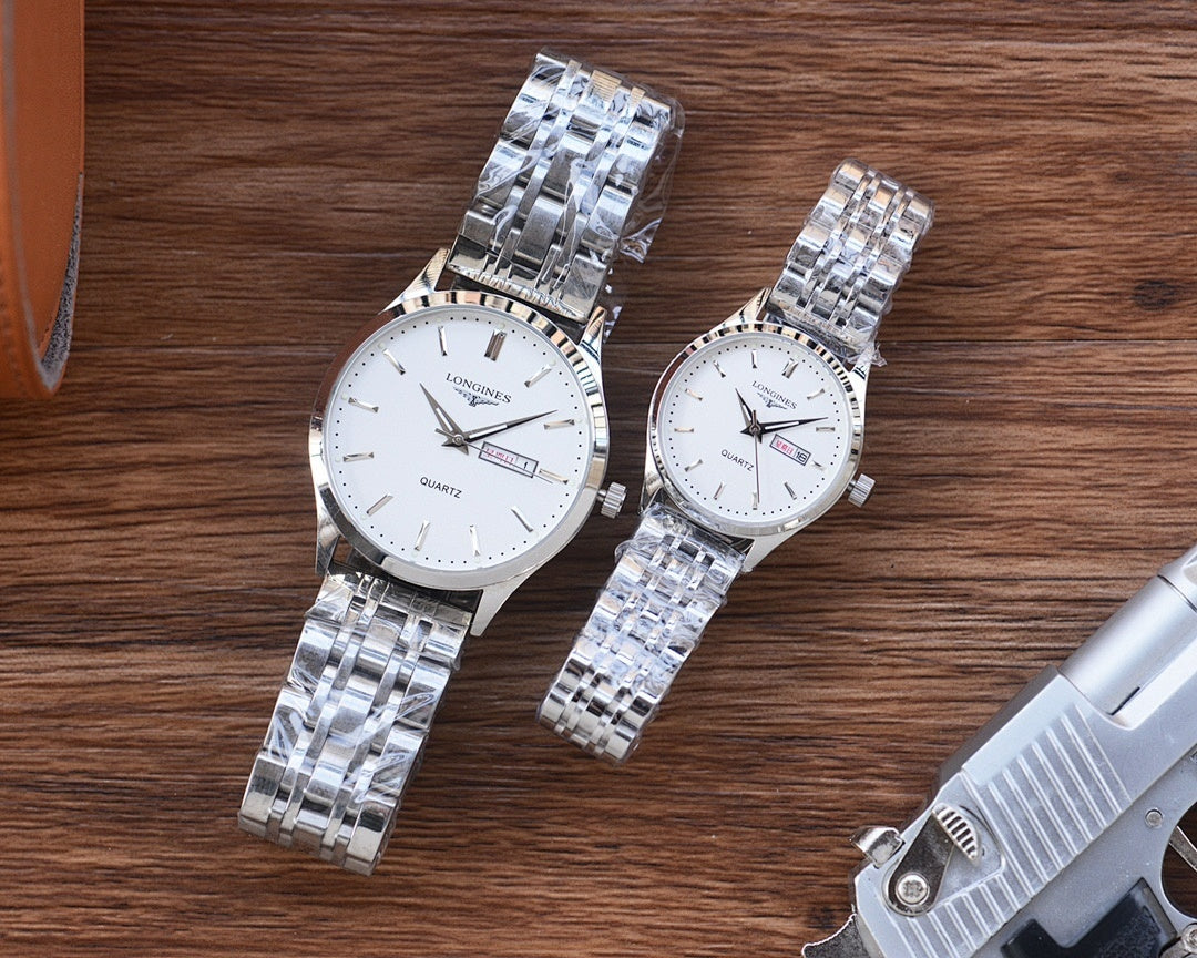 Longines watch with silver link bracelet and white dial, round case