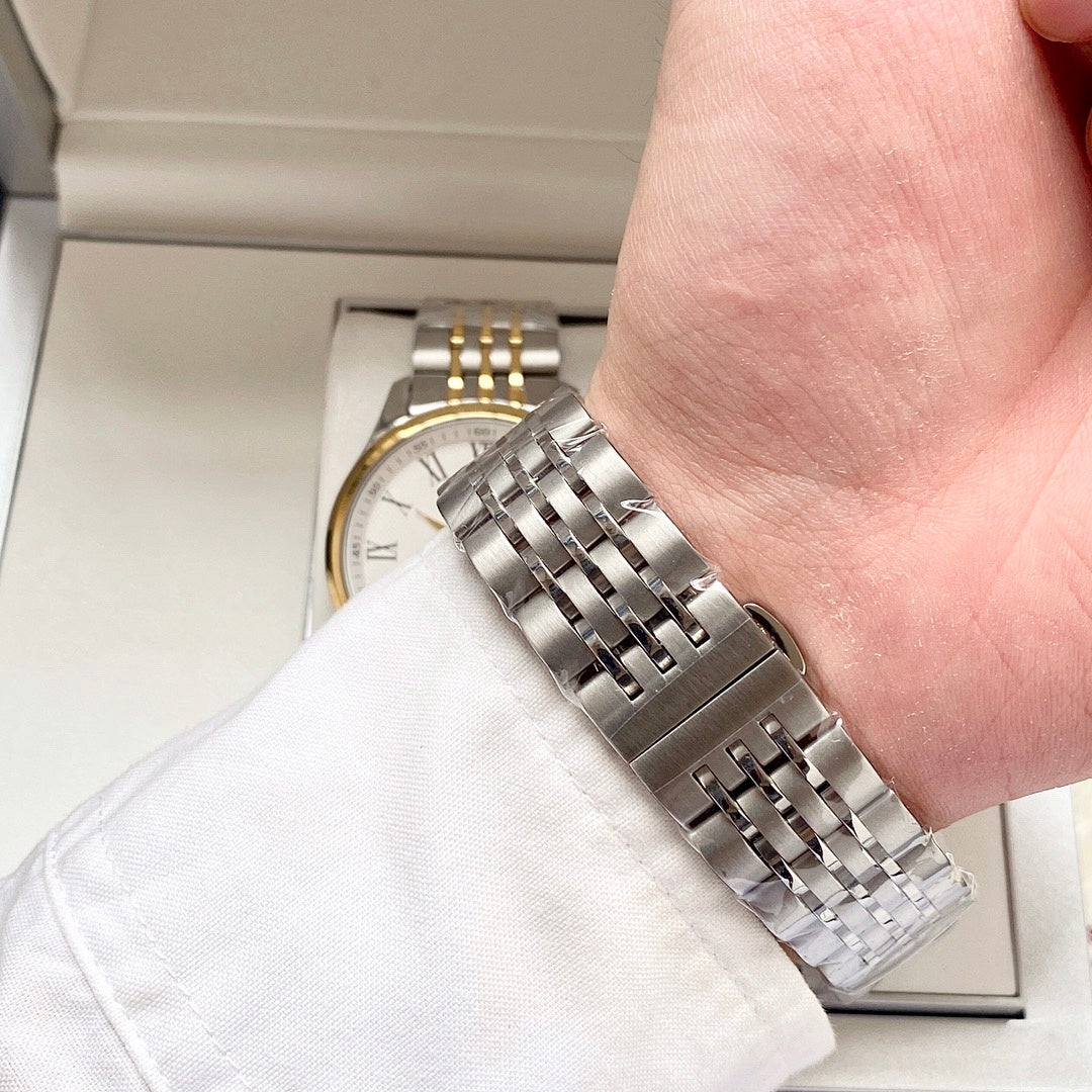 Longines watch bracelet close-up on wrist, silver metal links
