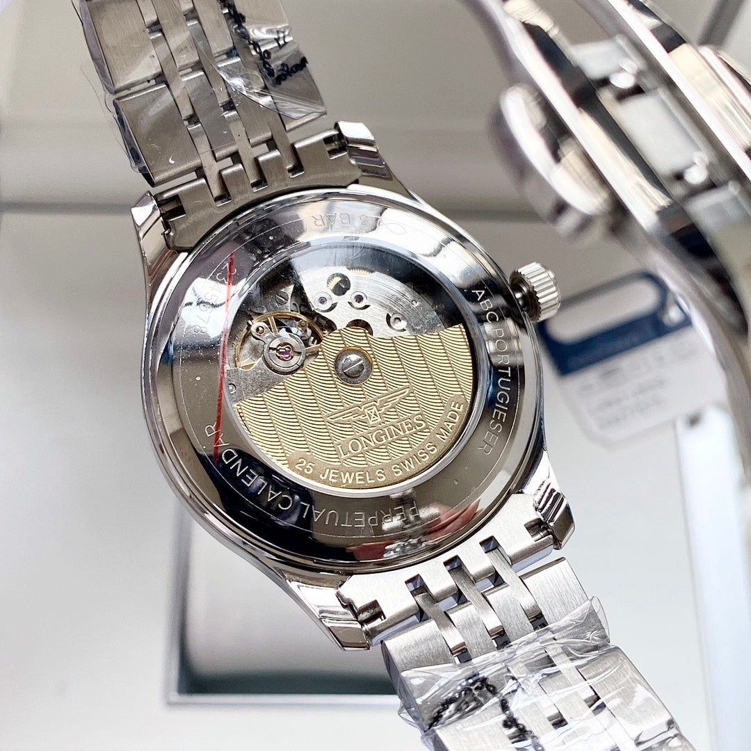 Longines watch caseback with exposed mechanical movement, silver metal