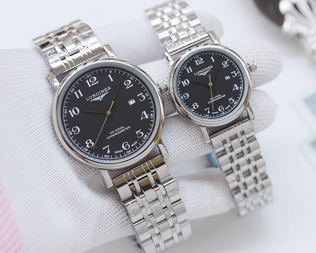 Pair of stainless steel wristwatches with dark dials and linked metal bracelets