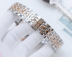Stainless steel watch bracelet with alternating polished and textured metal links