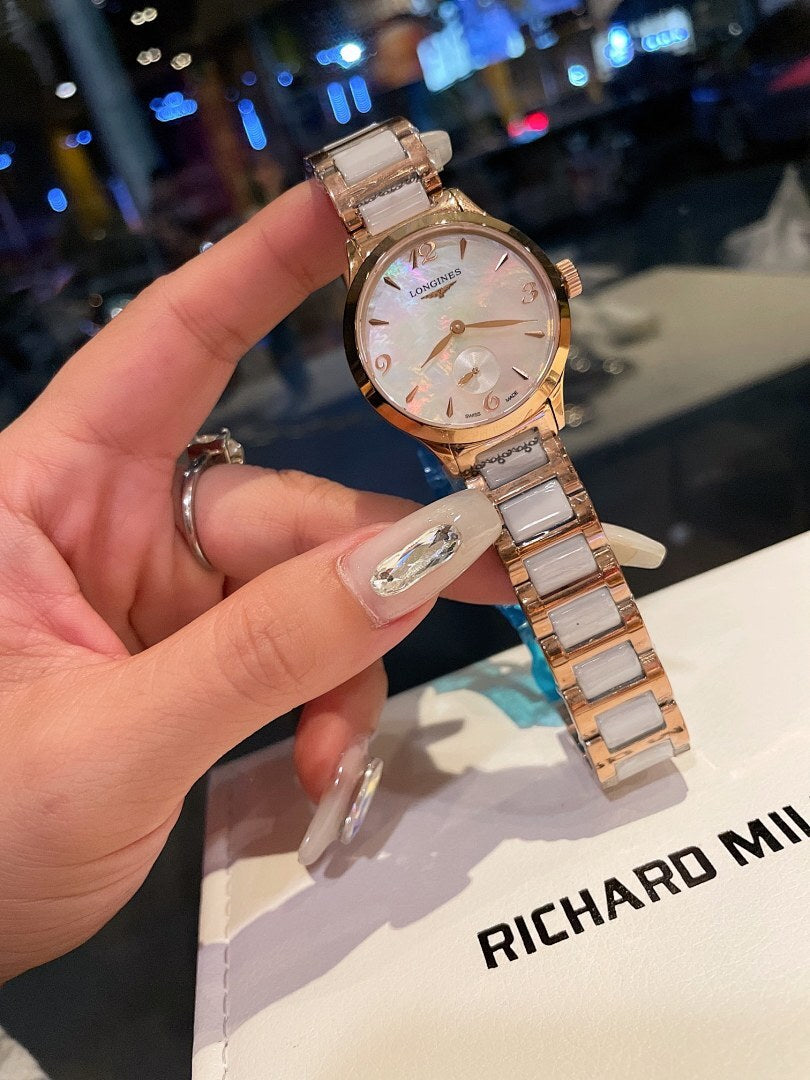 Longines rose gold-tone wristwatch, round dial with subdials, link bracelet