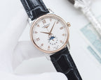 Longines wristwatch with black leather strap and white dial, rose-gold tone bezel