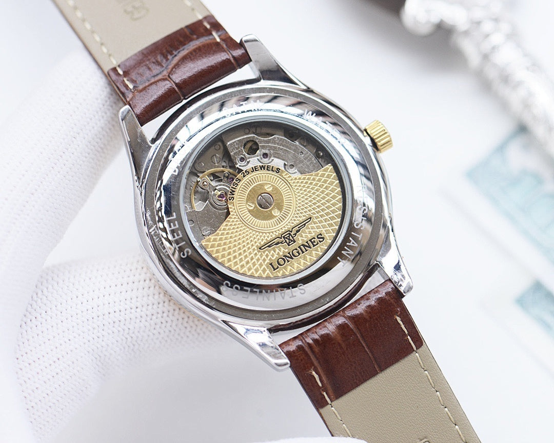 Automatic watch caseback with visible mechanical movement and brown leather strap