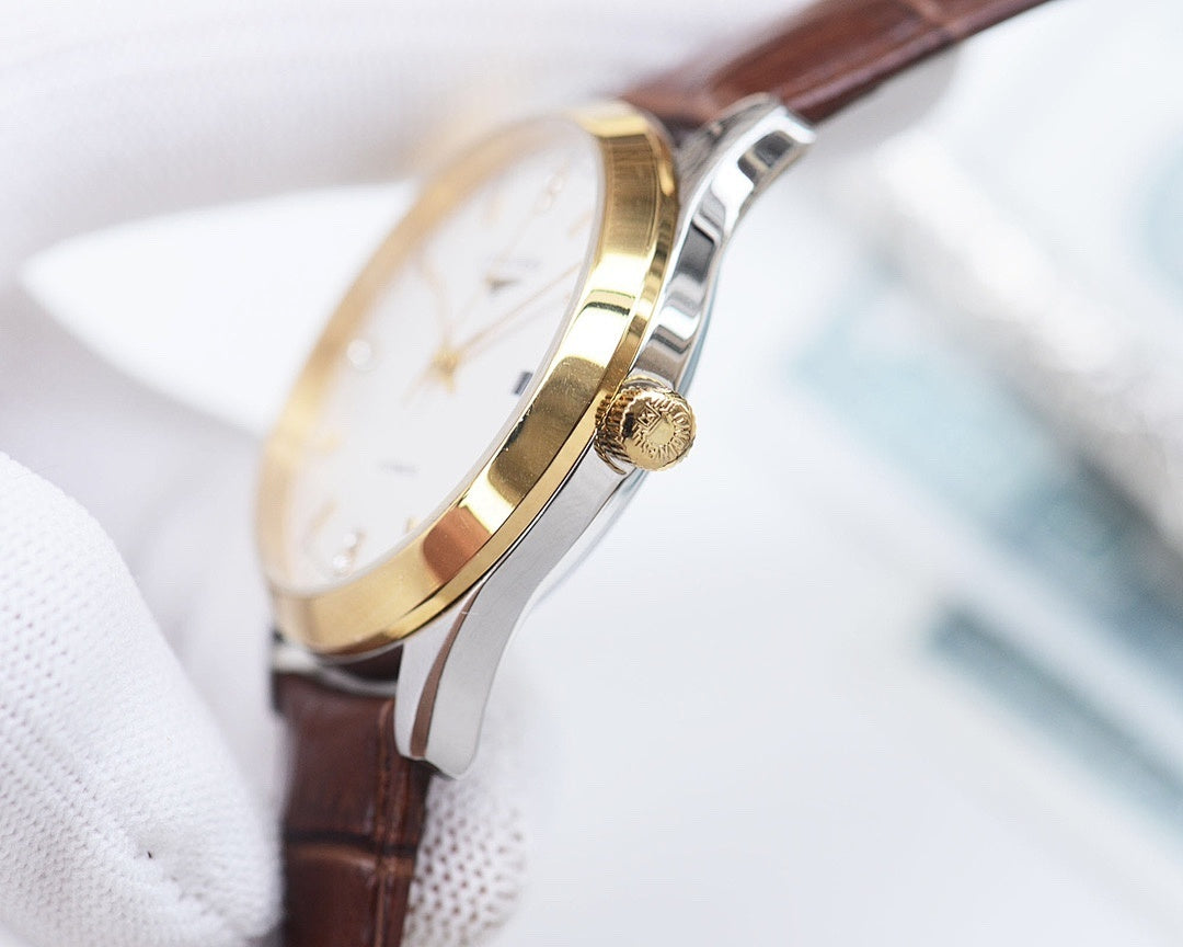 Automatic wristwatch with brown leather strap and gold-tone bezel