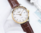 Automatic wristwatch with white dial, gold-tone case, and brown leather strap