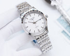 Automatic wristwatch with white dial, silver case, and stainless steel link bracelet