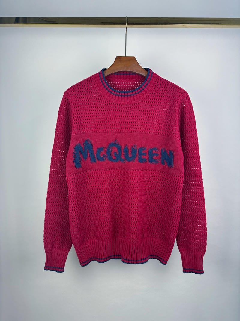 Crewneck knit sweater in magenta with blue trim and McQueen logo band across chest