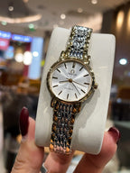 Omega wristwatch with white dial, gold-tone case, and linked metal bracelet