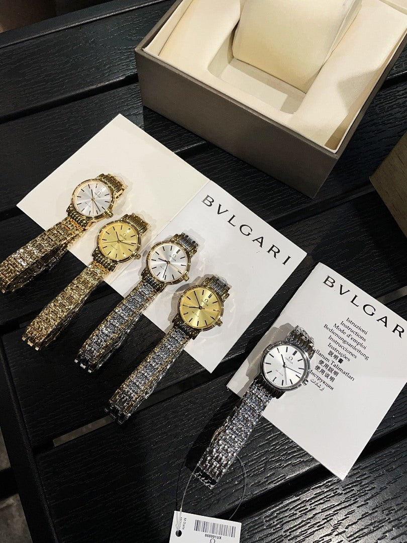 Set of jeweled-bezel wristwatches with metallic bracelets on product cards