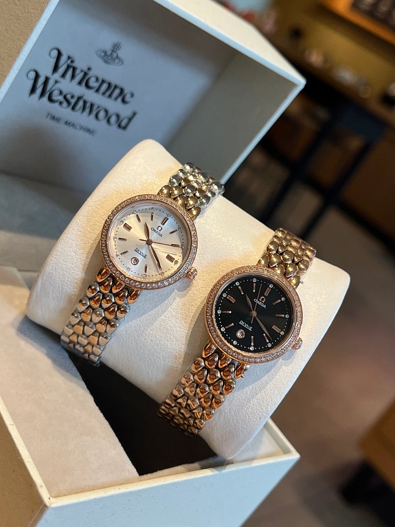 Pair of Omega wristwatches with white and black dials, gem-set bezels, link bracelets