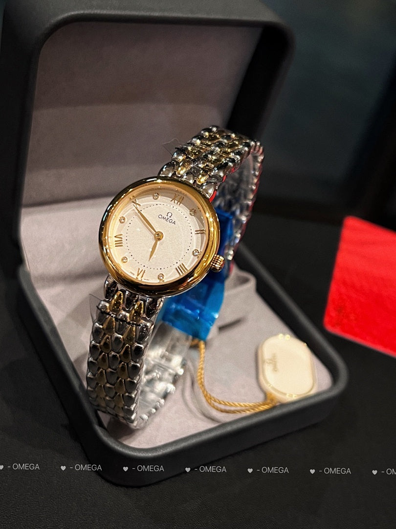 Omega wristwatch with gold-tone case, white dial, and textured gold link bracelet