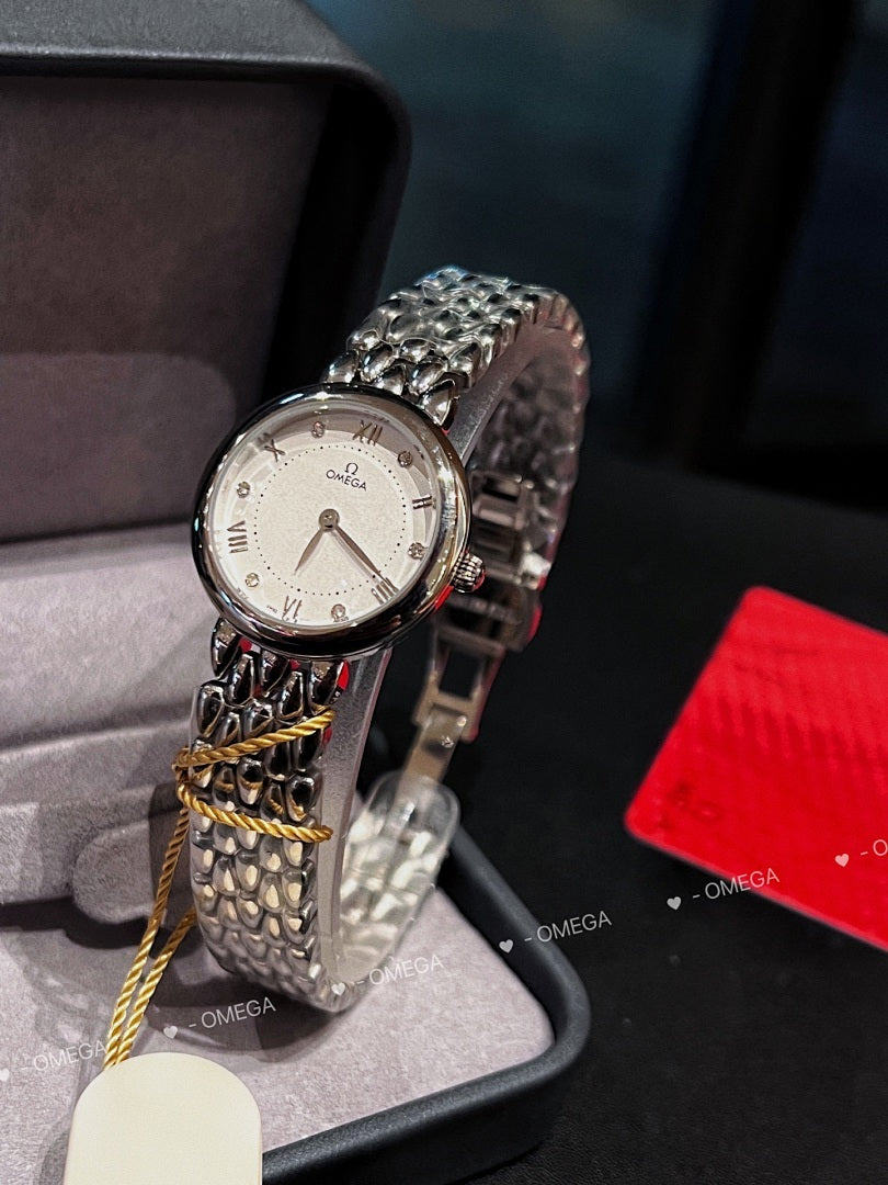 Omega watch with silver link bracelet, white dial, and yellow cord near the bezel