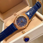 Omega wristwatch with blue dial, rose-gold case, blue leather strap, crystal bezel