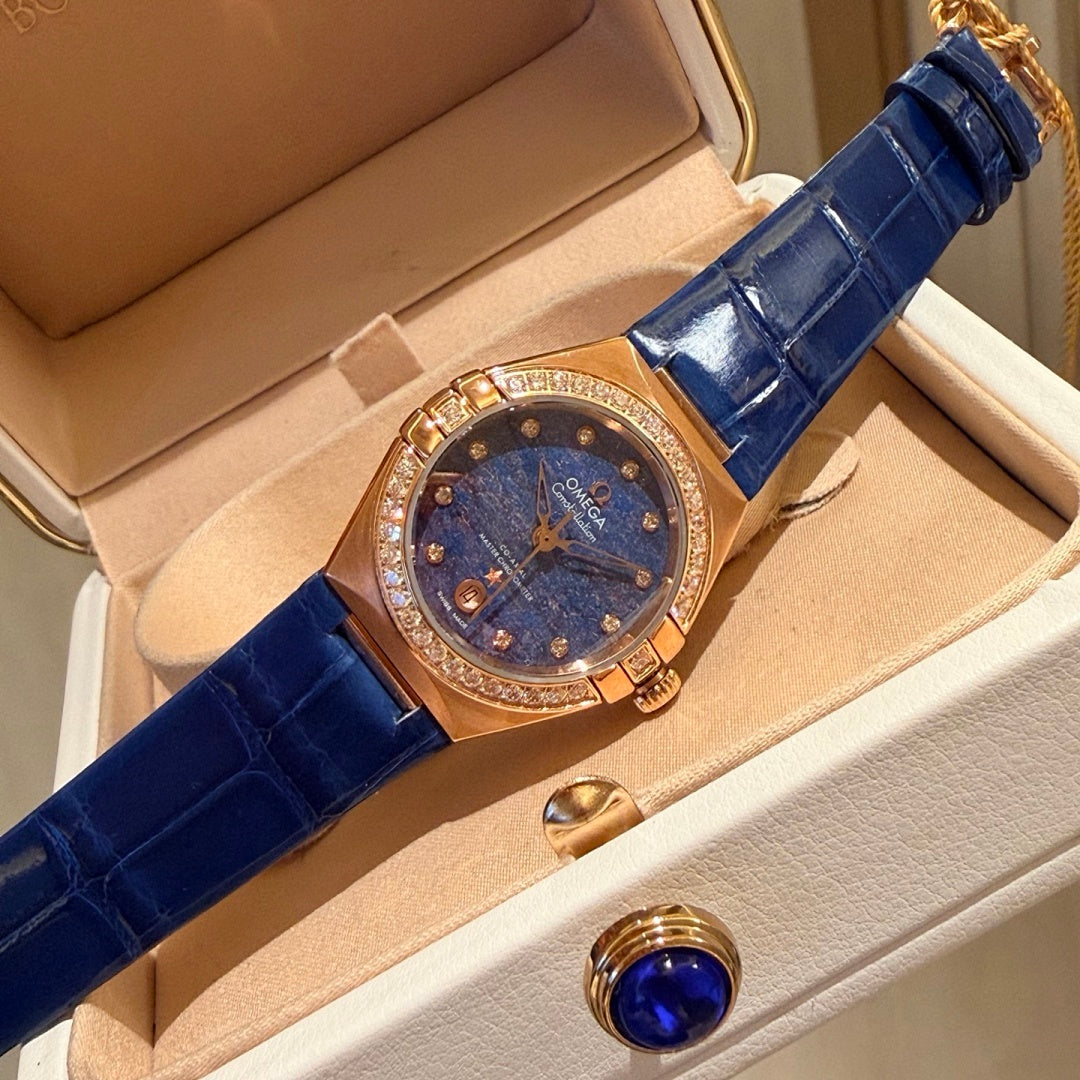 Omega wristwatch with blue dial, rose-gold case, blue leather strap, crystal bezel