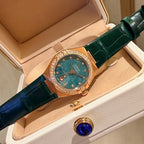 Omega wristwatch with green dial, rose-gold case, green leather strap, crystal bezel
