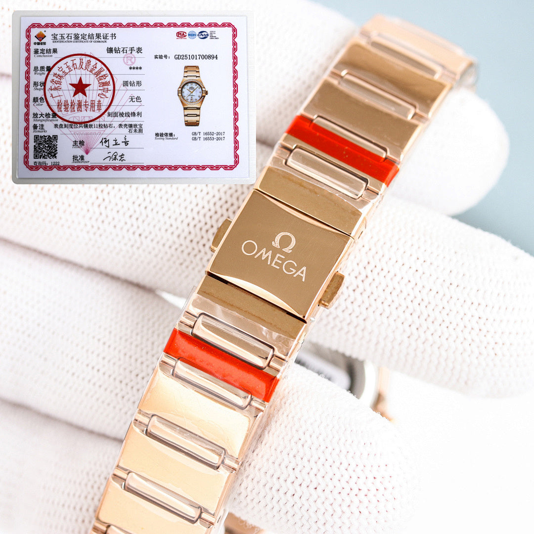 Omega wristwatch with rose gold metal bracelet, dial edge close-up, warranty tag attached.