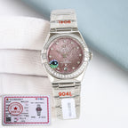 Omega wristwatch with silver bracelet, pink textured dial, diamond bezel and gem hour marks.