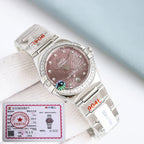 Omega wristwatch with silver bracelet, pink textured dial, diamond-set bezel and markers.