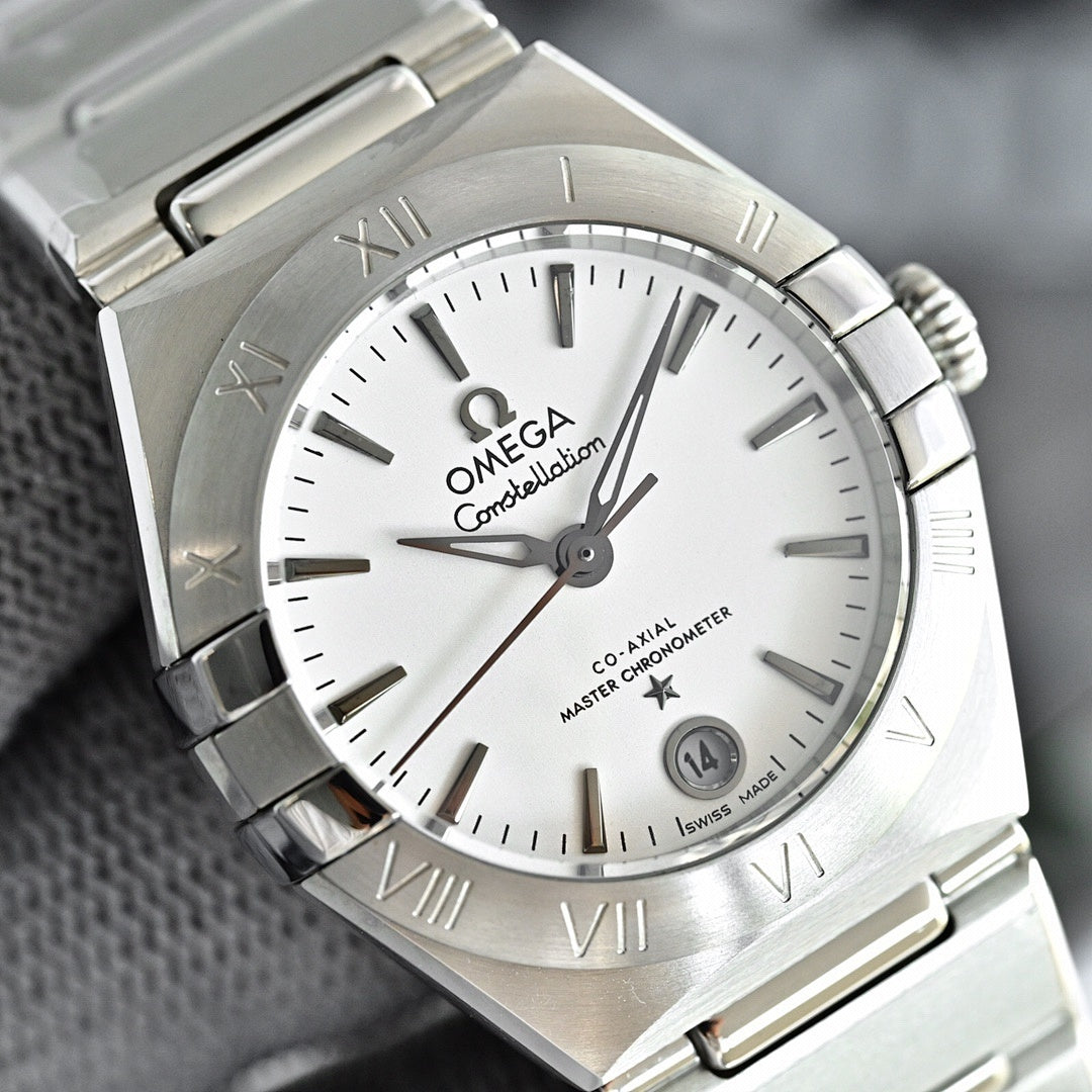 Omega Constellation wristwatch with silver case and bracelet, white dial with Roman numerals
