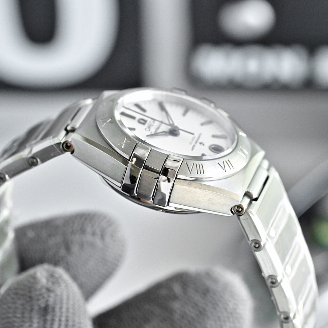 Omega Constellation wristwatch with silver case and bracelet, white dial and Roman numerals