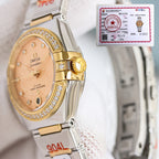 Omega watch with gold bezel, champagne dial, and silver-and-gold metal bracelet