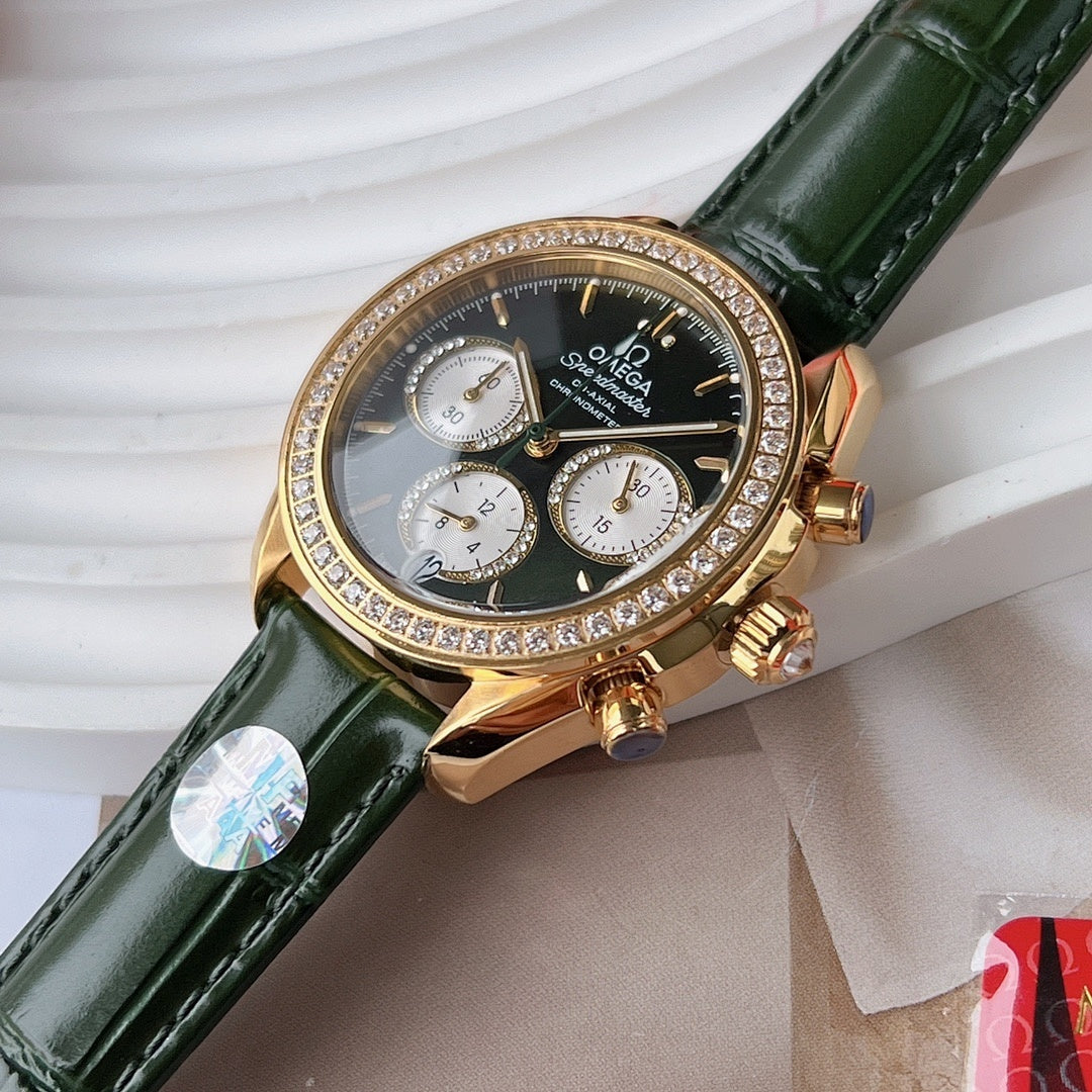 Gold-tone diamond bezel wristwatch with green leather strap, close view
