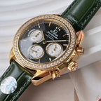 Diamond bezel chronograph wristwatch with green leather strap and gold hands
