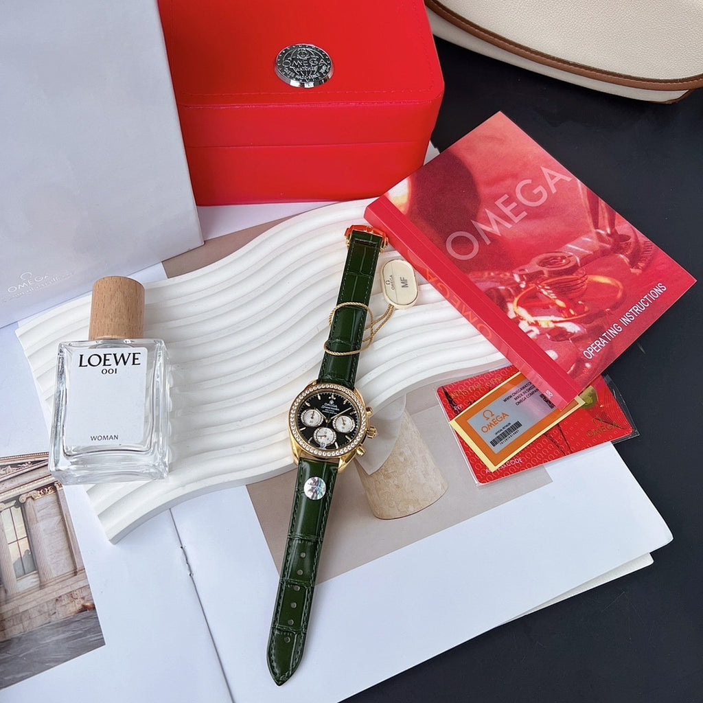 Green leather strap wristwatch with gold-tone case and sub-dials