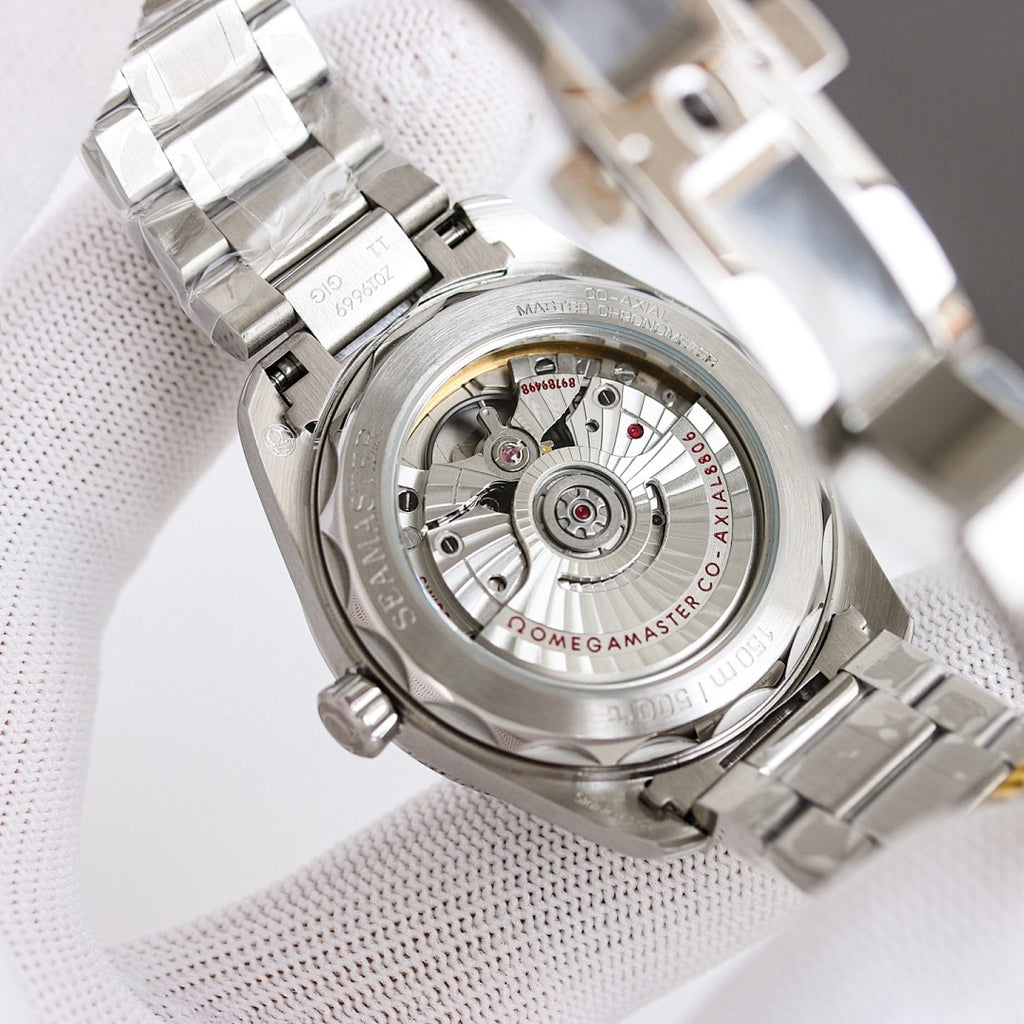 Omega wristwatch open caseback showing mechanical movement through glass